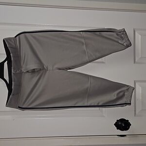 Easton baseball pants with navy blue piping